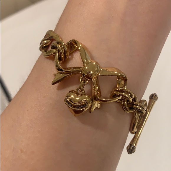 Juicy Couture Jewelry - Juicy couture bow heart dangle gold bracelet